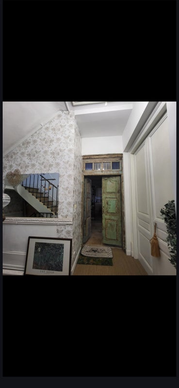 Photo 1: Entrée de la maison (dans le porche)